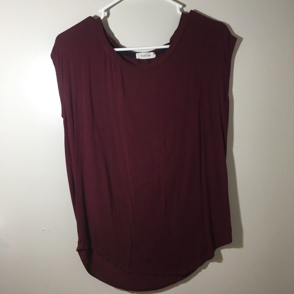 Maroon colored T-shirt. Lightly used.